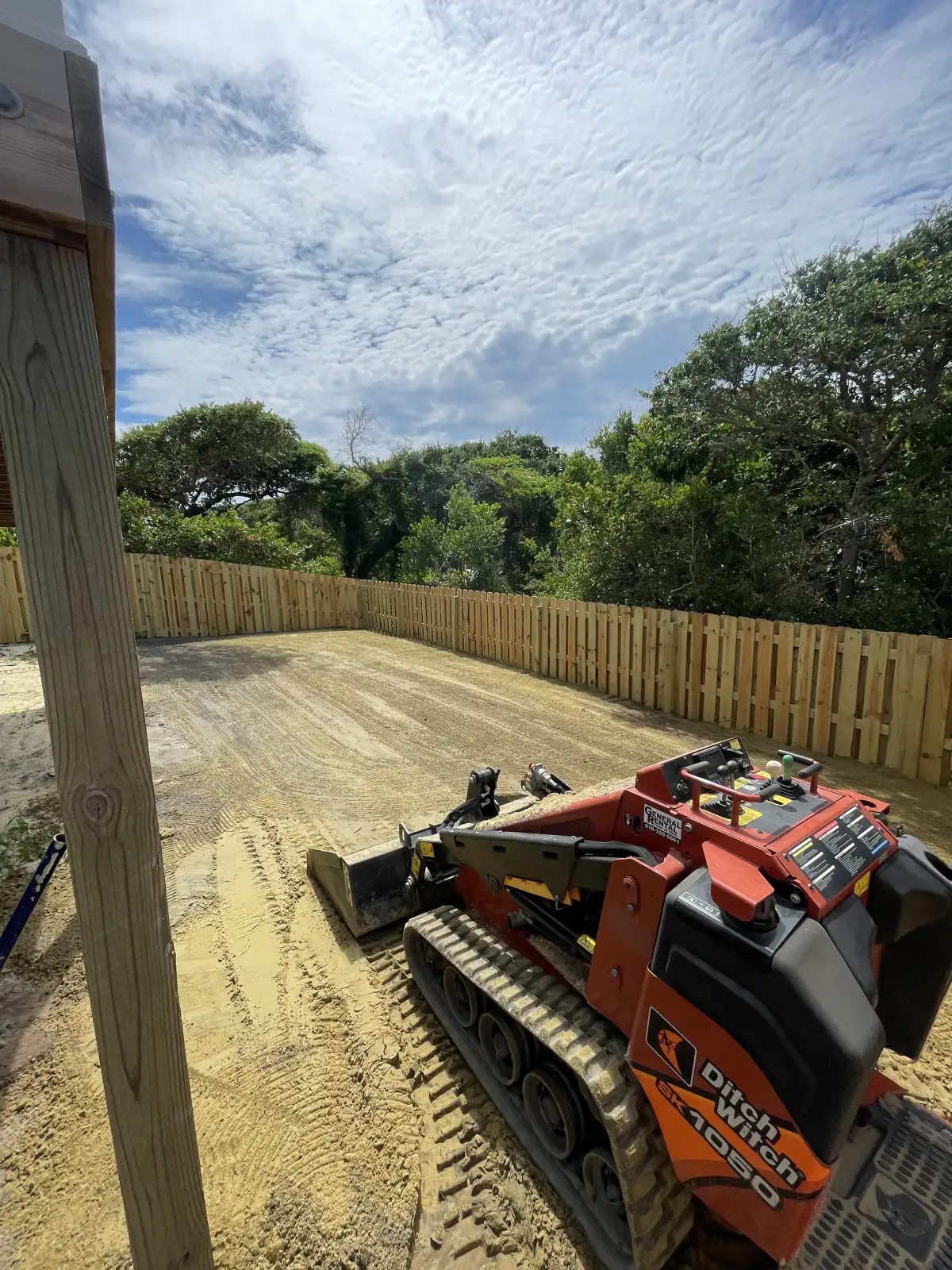 Drainage and grading equipment prepared for a coastal NC outdoor living project